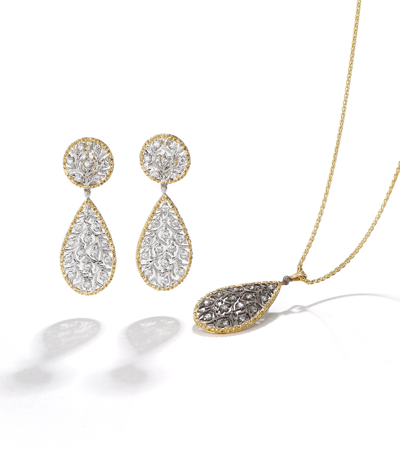 Ramage Pendant earrings and drop-shaped pendant with leaf-modeled yellow gold borders